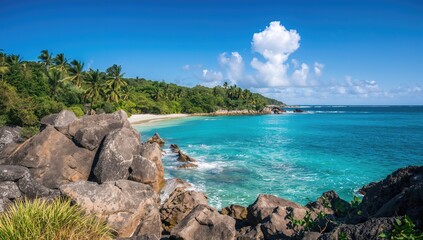 Naklejka premium Tropical rocky shoreline at Anse Songe, showcasing natural erosion risk