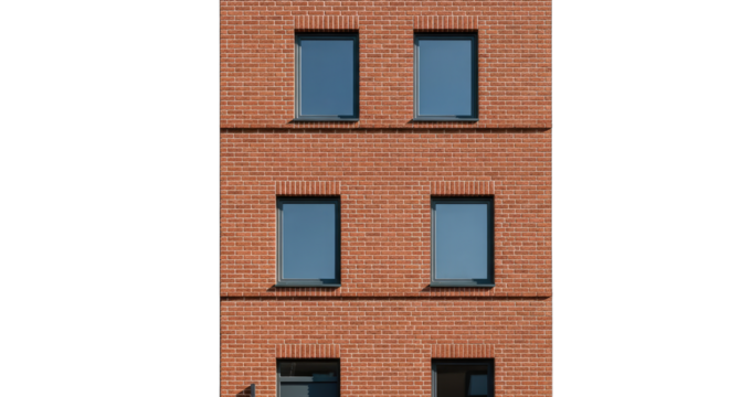 Red brick building facade with multiple windows on a sunny day with clear blue sky and white horizontal lines patterns between bricks for architectural exterior detail