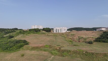 A clear view of Yalova University in Yalova, Turkey, showcasing its modern architecture and well-organized campus environment. The scene reflects contemporary educational design with clean lines, open
