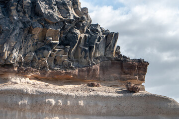Southern Tenerife coastline from a boat with cliffs and mountains