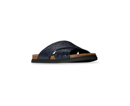 Man's Navy Blue leather slide sandal with a cross strap design, cork footbed, and a black rubber sole, comfortable slip-on style. Ideal for casual wear.