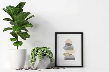 Fiddle leaf fig and trailing plant with abstract art
