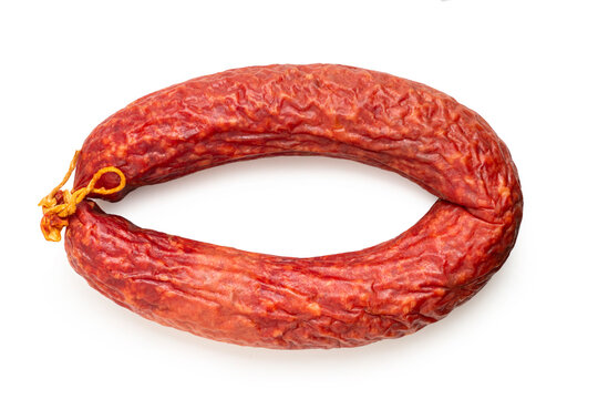 smoked sausage ring on a white isolated background