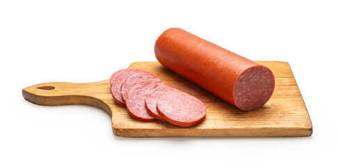 Smoked sausage on a kitchen board, white isolated background