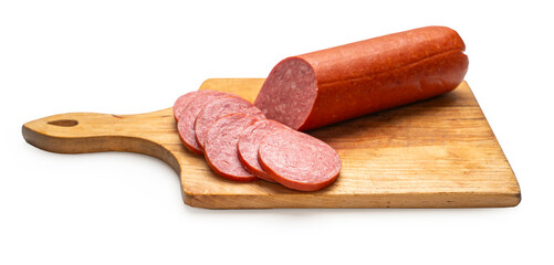 Smoked sausage on a kitchen board, white isolated background