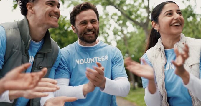 Applause, stack of hands and volunteers outdoor with solidarity, unity and teamwork. Happy, nature and group of people with celebration in park for ngo, non profit or social responsibility outreach. - Powered by Adobe