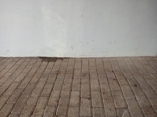 Paving Block Floor Perspective with Blank White Wall Background