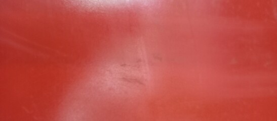Smooth Vibrant Red Plastic Surface Minimalist Background