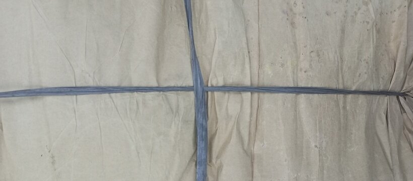 Tightly Tied Brown Kraft Paper Parcel Knot Background - Powered by Adobe