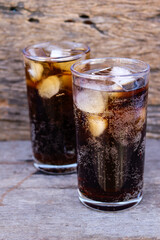 Soft drink cola with iced on glass