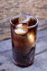 Soft drink cola with iced on glass