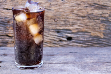 Soft drink cola with iced on glass