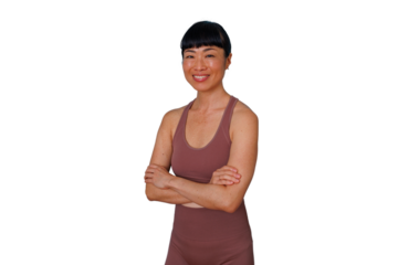 Woman with curly hair smiling, holding and looking down at a smartphone, texting or browsing social media, transparent background