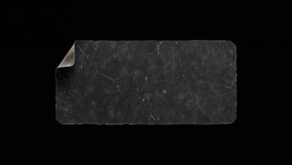 Old Black Paper Sticker Label with Rounded Corners, suitable for design elements or product labels, isolated on a grunge black background
