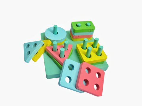 Colorful Wooden Geometric Shape Sorting Toy for Early Learning, Preschool Education, Fine Motor Skills, Cognitive Development, and Kids Montessori Activity Isolated on White Background
