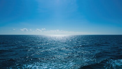 The vast blue ocean under a clear sky, a serene backdrop for relaxation and travel
