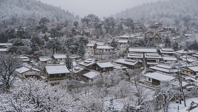 Shirakawa-go, a historic Japanese village blanketed in winter snow, showcasing traditional gassho-style architecture, seasonal change