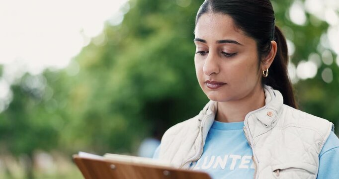 Clipboard, volunteer or woman in park, charity event or community service with checklist. NGO project, documents or person with planning, nonprofit sign up or inventory for donations or registration
