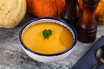 Vegan pumpkin cream soup served sesam