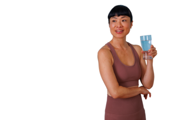 Confident mature businesswoman with curly hair holding a digital tablet, looking at camera on transparent background