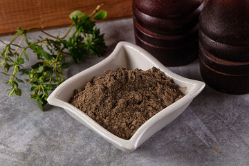 Ground dry black pepper powder