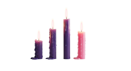 Four candles of different colors and heights on a png transparent.