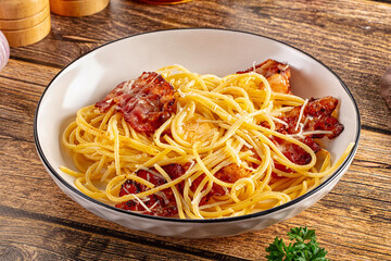 Italian classic spaghetti carbonara with bacon and egg