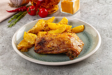 Baked chicken thighs with potatoes