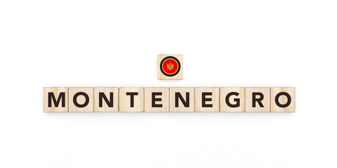 Wooden blocks bearing the name and flag of Montenegro. Montenegrin and European Culture, national...