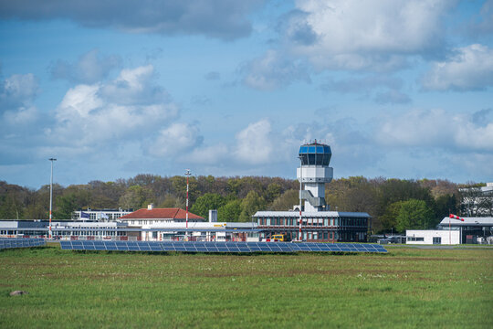 Eelde, Netherlands - April 14, 2024: Air Traffic Control Tower and Terminal of Groningen Airport Eelde, Airfield in the North of the Netherlands