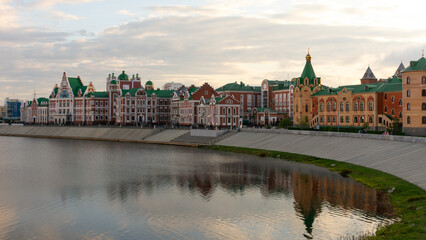 Fototapeta premium A view of the Amsterdam embankment on the Malaya Kokshaga River in the city of Yoshkar-Ola