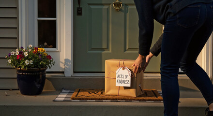 Person Delivering a Charity Package to Front Door with Flowers in Pots for Community Giving, Warm Hearts Season, and Philanthropic Social Media Content