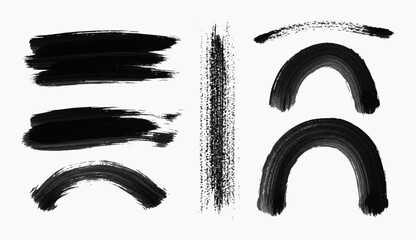 Collection of abstract black brush strokes and arched shapes on a white background