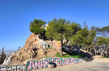 Photo of Strefi Hill, a limestone hill and urban natural park between Neapoli and Exarcheia in Athens,offering greenery, trails, city views, and a peaceful escape.