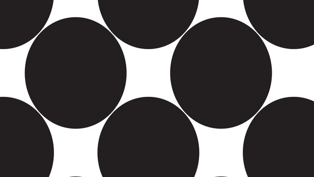 Abstract composition of dark gray circles overlapping against a stark black background.