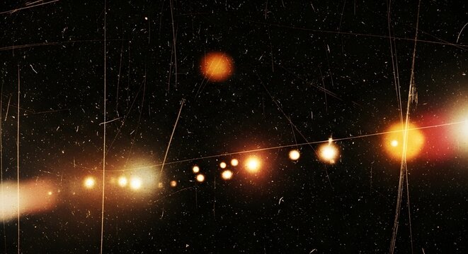 Dramatic vintage film effect overlay with golden light leaks and scratches, perfect for adding retro charm and nostalgic vibes to your creative projects