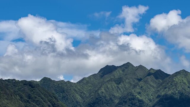 Clouds Time-lapse photography. Puʻu Kōnāhuanui consists of two mountain peaks, Kōnāhuanui 1 (K1) and Kōnāhuanui 2 (K2), Honolulu, Oahu, Hawaii. It is the highest point in the Koʻolau Mountains.