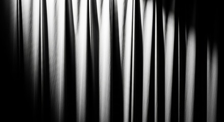 Obraz premium Vertical Fabric Folds with Dramatic Lighting, Black and White Textile Texture