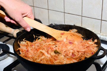 Lithuanian bigos is a dish of stewed cabbage (fresh and pickled) with meat.