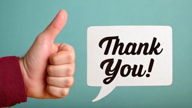 Hand giving a thumbs up and a speech bubble saying "thank you". The image conveys a positive and appreciative message
