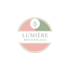 A logo design with a botanical theme featuring a floral emblem and pastel color palette