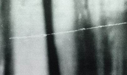 Grainy distressed old photo light leaks, film grain, dust and scratches texture overlay with vignette border. Dirty grunge analog 8k widescreen retro effect background with copy space