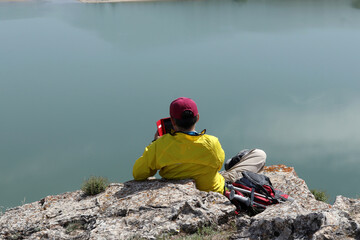 Traveler man taking photos on vacation