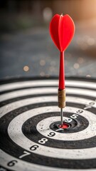 Fototapeta premium Red Dart Hitting Bullseye On Target Board Symbolizing Precision Accuracy Success And Strategic Achievement