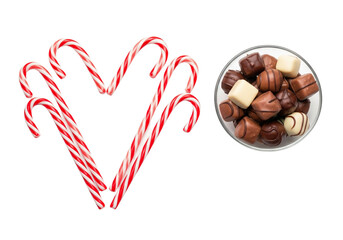 Sweet Indulgence: Heart-shaped Candy Canes and Assorted Gourmet Chocolates on White Background