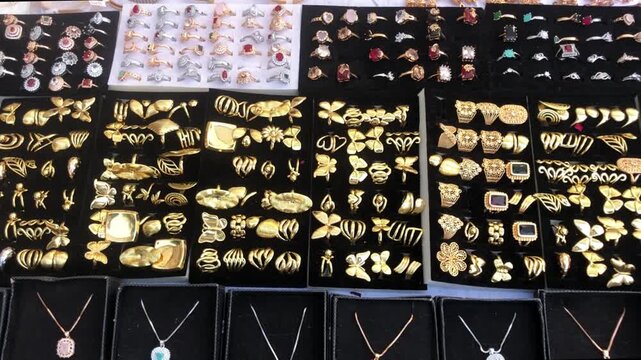 High-Quality Artificial Jewelry Display at Market Stall | Fashion Rings and Accessories Showcase