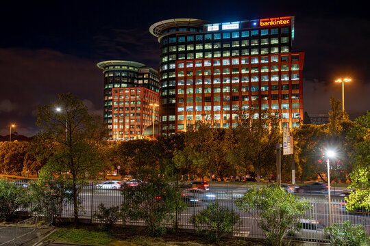 Nighttime image of the Bankinter building near the Sport Lisboa e Benfica football stadium. Lisbon - Portugal.