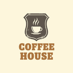 A vintage-style coffee house logo featuring a shield emblem with a steaming cup of coffee and the words "COFFEE HOUSE