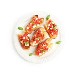 Tasty bruschettas with mozzarella cheese, tomatoes and basil isolated on white, top view