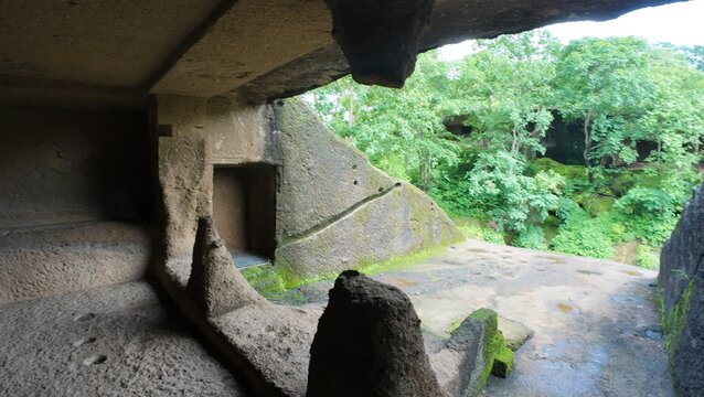 Exploring the Inner Chambers and Viharas of the Ancient Buddhist Rock-Cut Kanheri Caves, Revealing the Simple Living Spaces Used by Monks in Mumbai, Maharashtra.